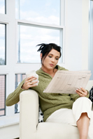 Woman Reading Newspaper